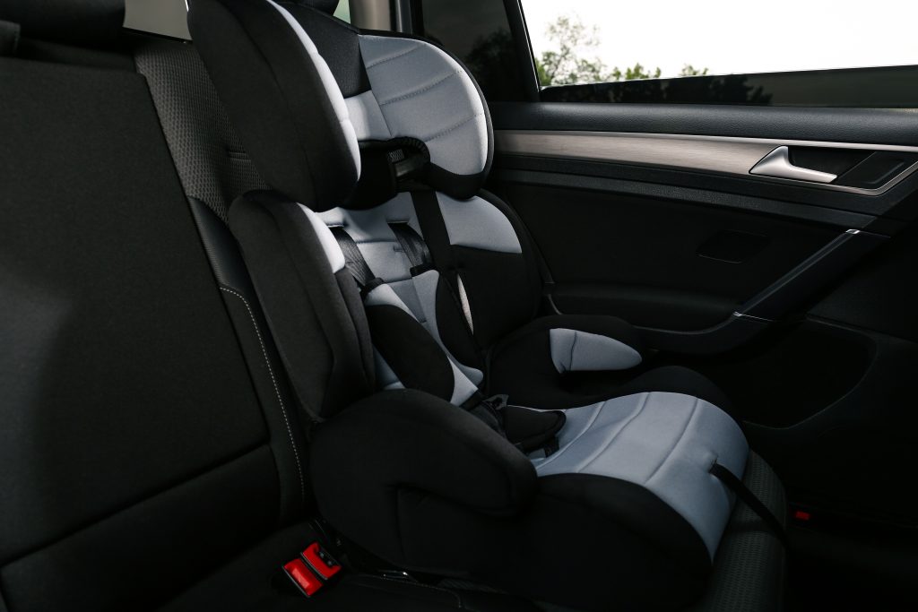Empty modern child safety seat in car - Black Car Services - Black Car Services