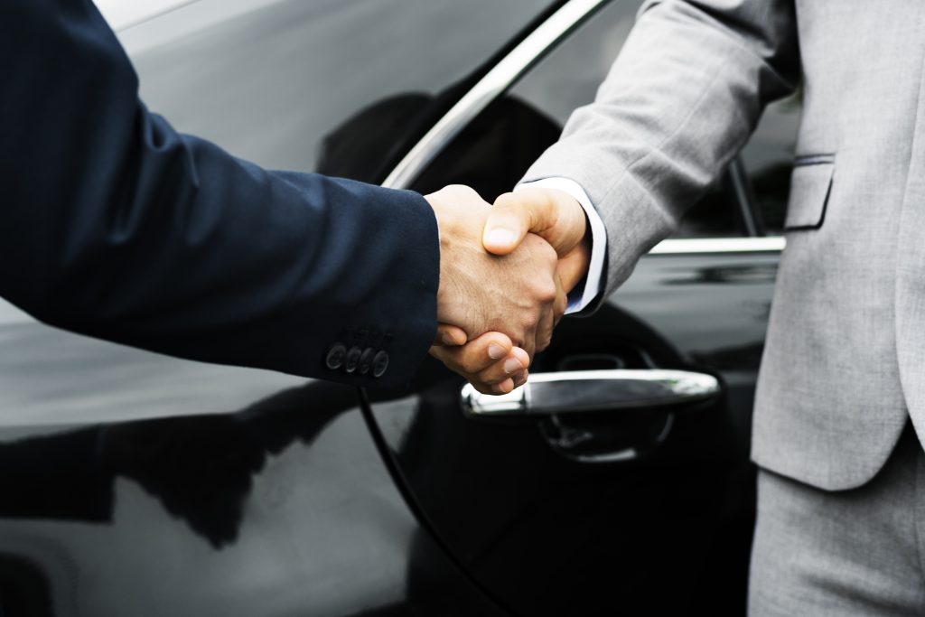 Business Men Agreement Deal Hands Shake - Black Car Services - Black Car Services